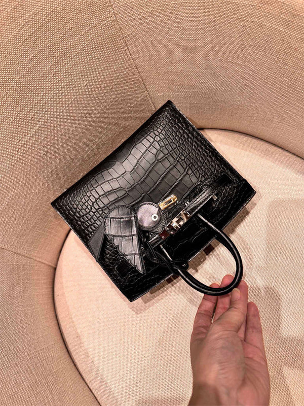  Tailored handbag carried on shoulder 10