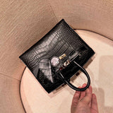  Tailored handbag carried on shoulder 10
