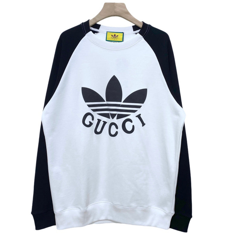 Front view of Gucci luxury clothing with tailored silhouette