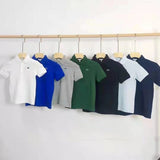 Side profile of Lacoste luxury clothing with signature branding