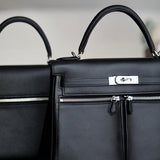 Side view of sophisticated structured handbag