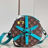 Side profile of structured signature women's handbag – women's everyday handbag