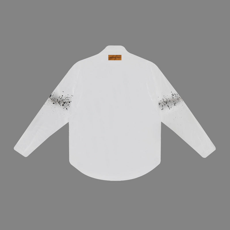 Close-up detail shot of Louis Vuitton luxury clothing with monogram-inspired silhouette