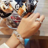 Side view of Cartier unisex jewelry piece