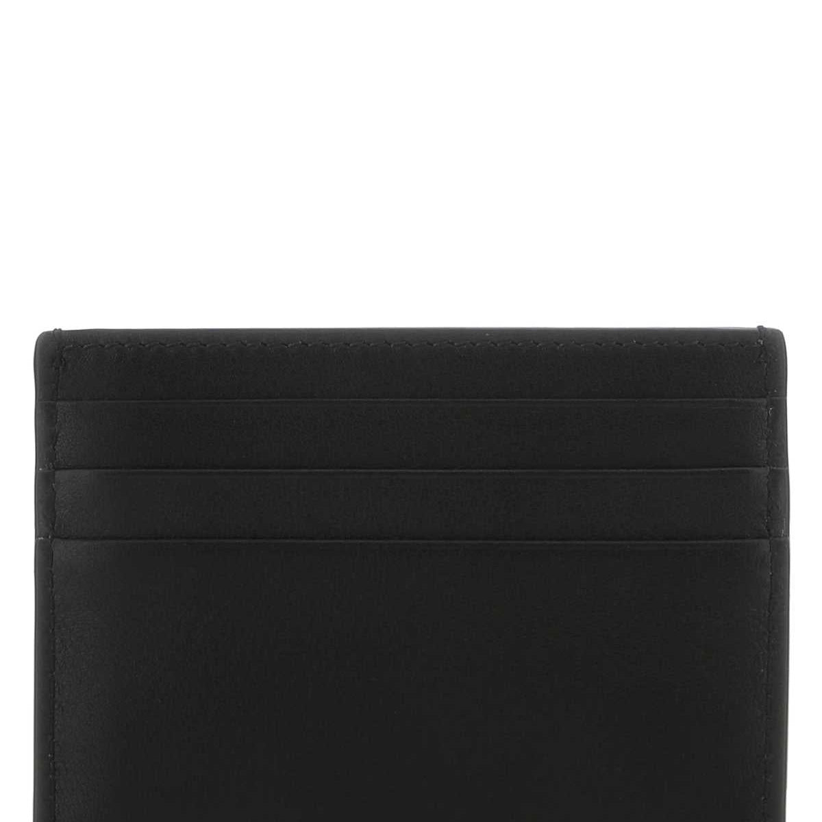 Alexander McQueen wallets side profile designer luxury fashion