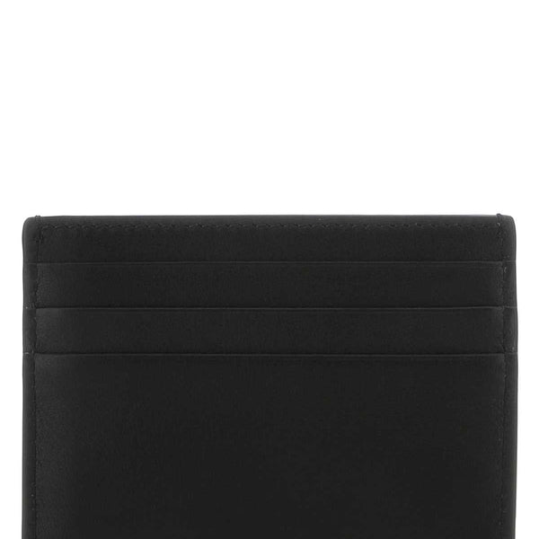 Alexander McQueen wallets side profile designer luxury fashion