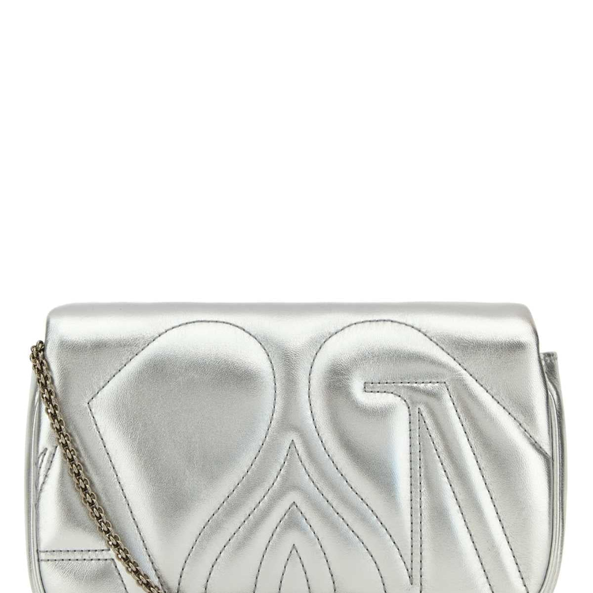 Alexander McQueen clutches side profile designer luxury fashion