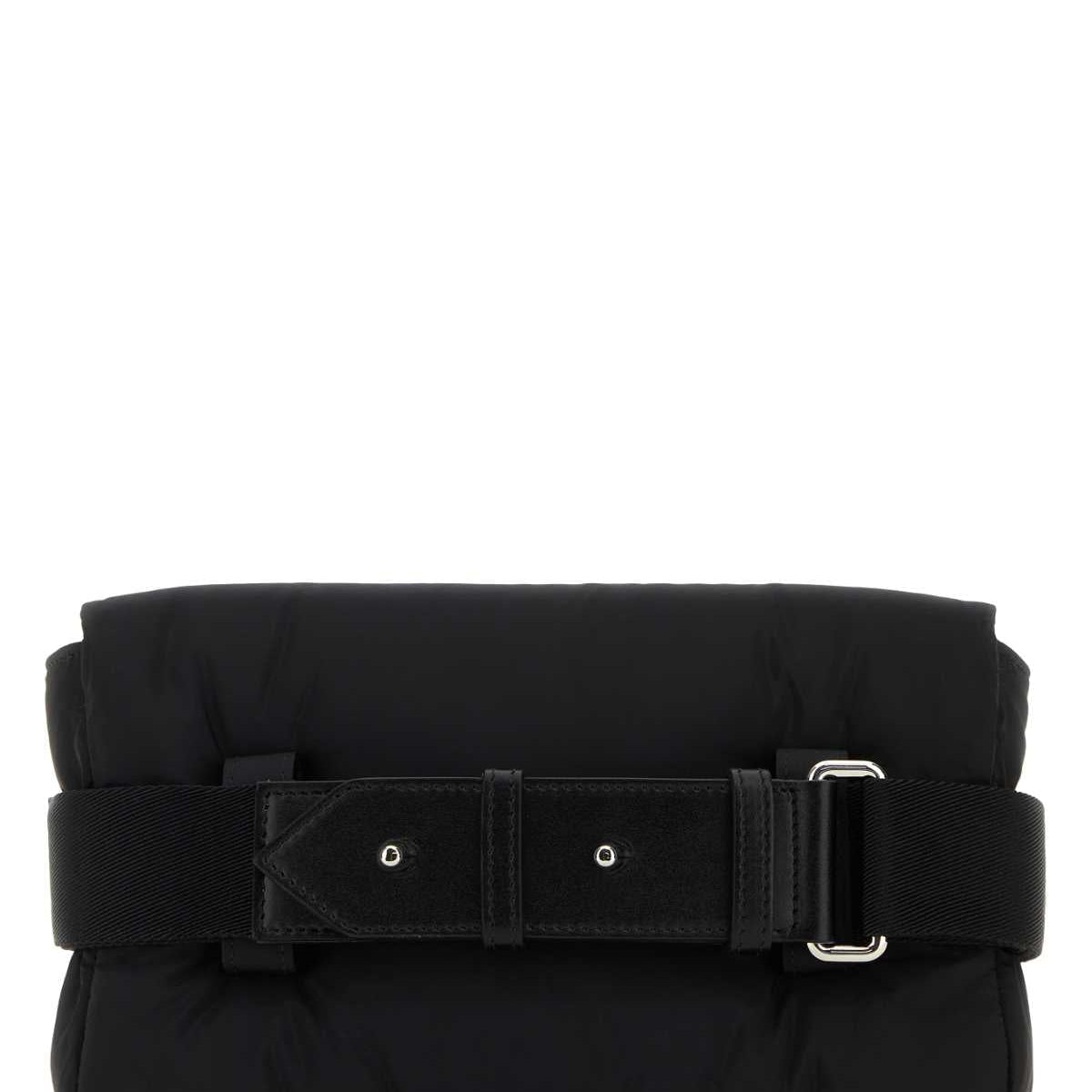 Alexander McQueen clutches side profile designer luxury fashion