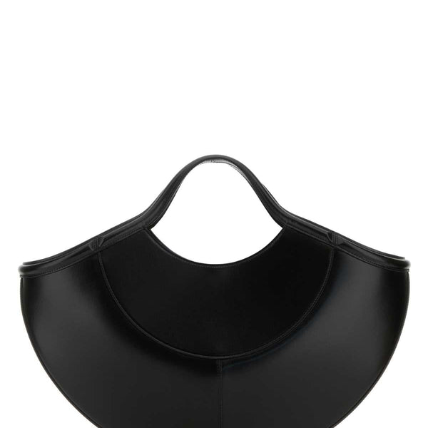 Alexander McQueen shoulder bags side profile designer luxury fashion