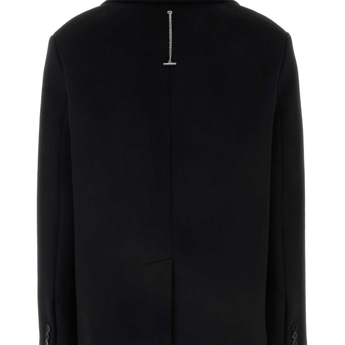 Alexander McQueen premium coats detail and craftsmanship close-up