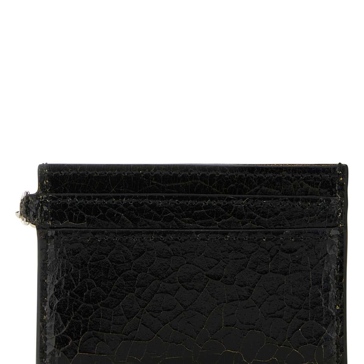 Alexander McQueen wallets side profile designer luxury fashion