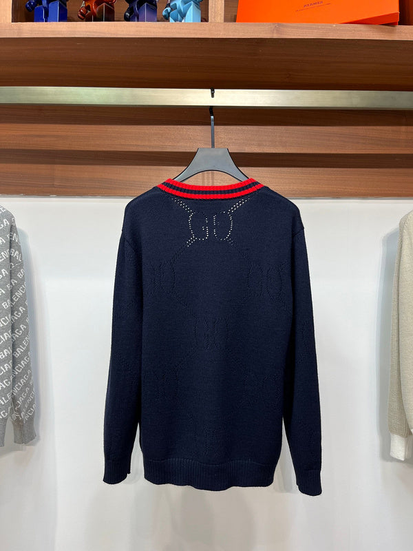 Back view of Gucci luxury clothing with label-forward styling