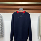 Back view of Gucci luxury clothing with label-forward styling