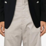 Close-up of Fendi pants hardware and fine stitching