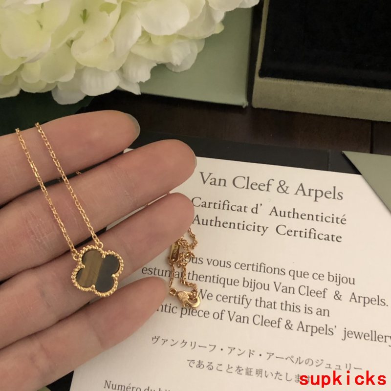 Lifestyle view of Van Cleef & Arpels unisex jewelry piece