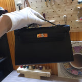 Side view of curated structured handbag