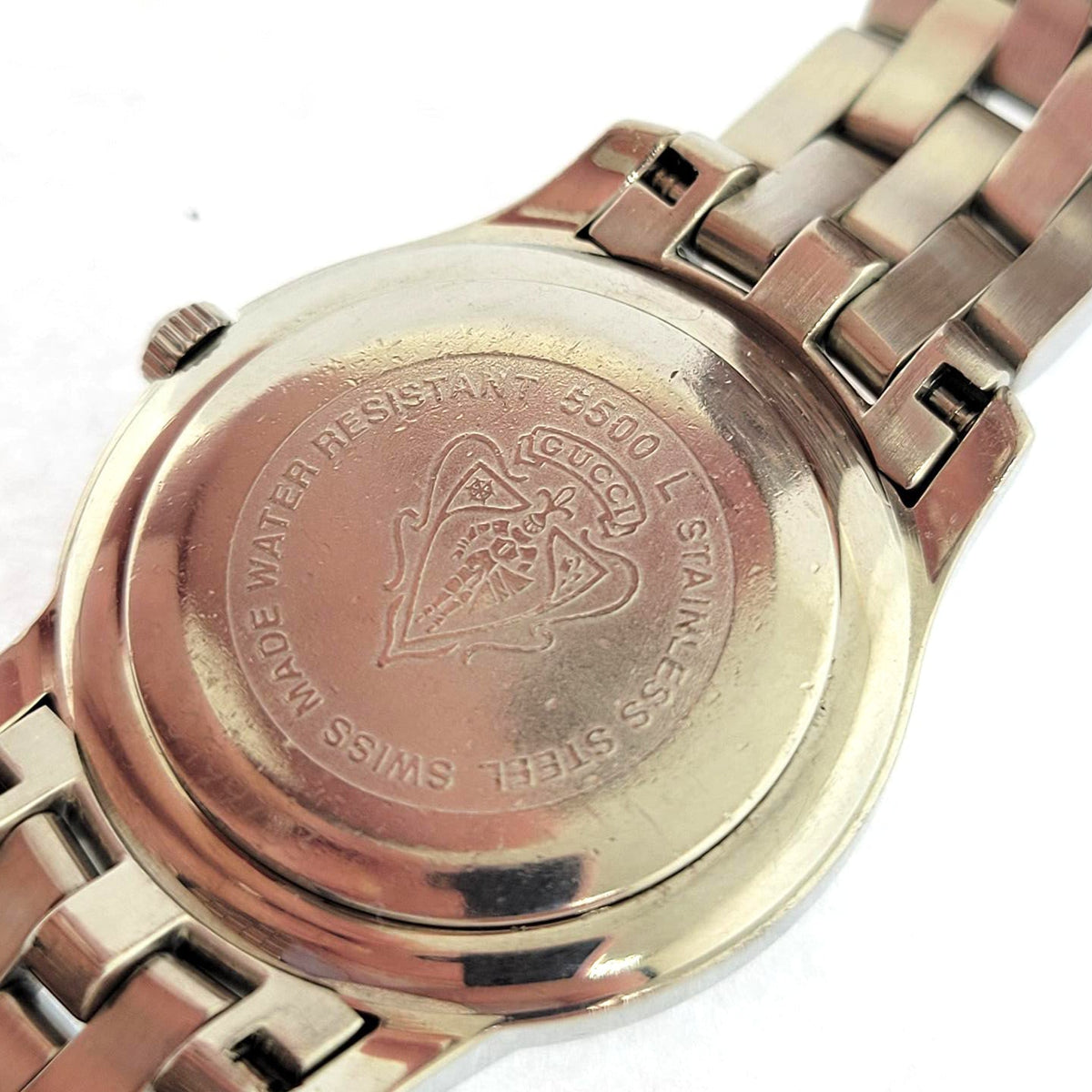 Close-up detail view of Gucci women's watch