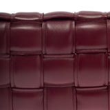 Close-up of Bottega Veneta cross body bags hardware and fine stitching