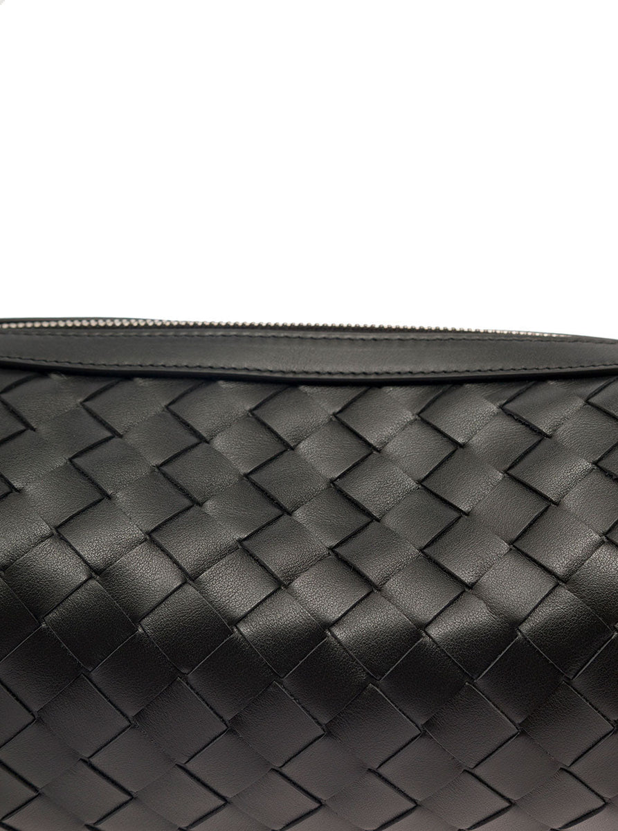 Close-up of Bottega Veneta cross body bags hardware and fine stitching
