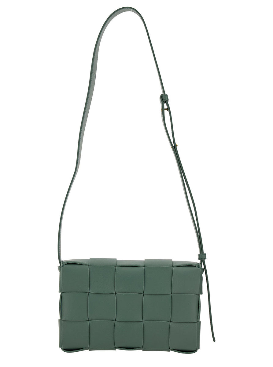 Close-up of Bottega Veneta cross body bags hardware and fine stitching