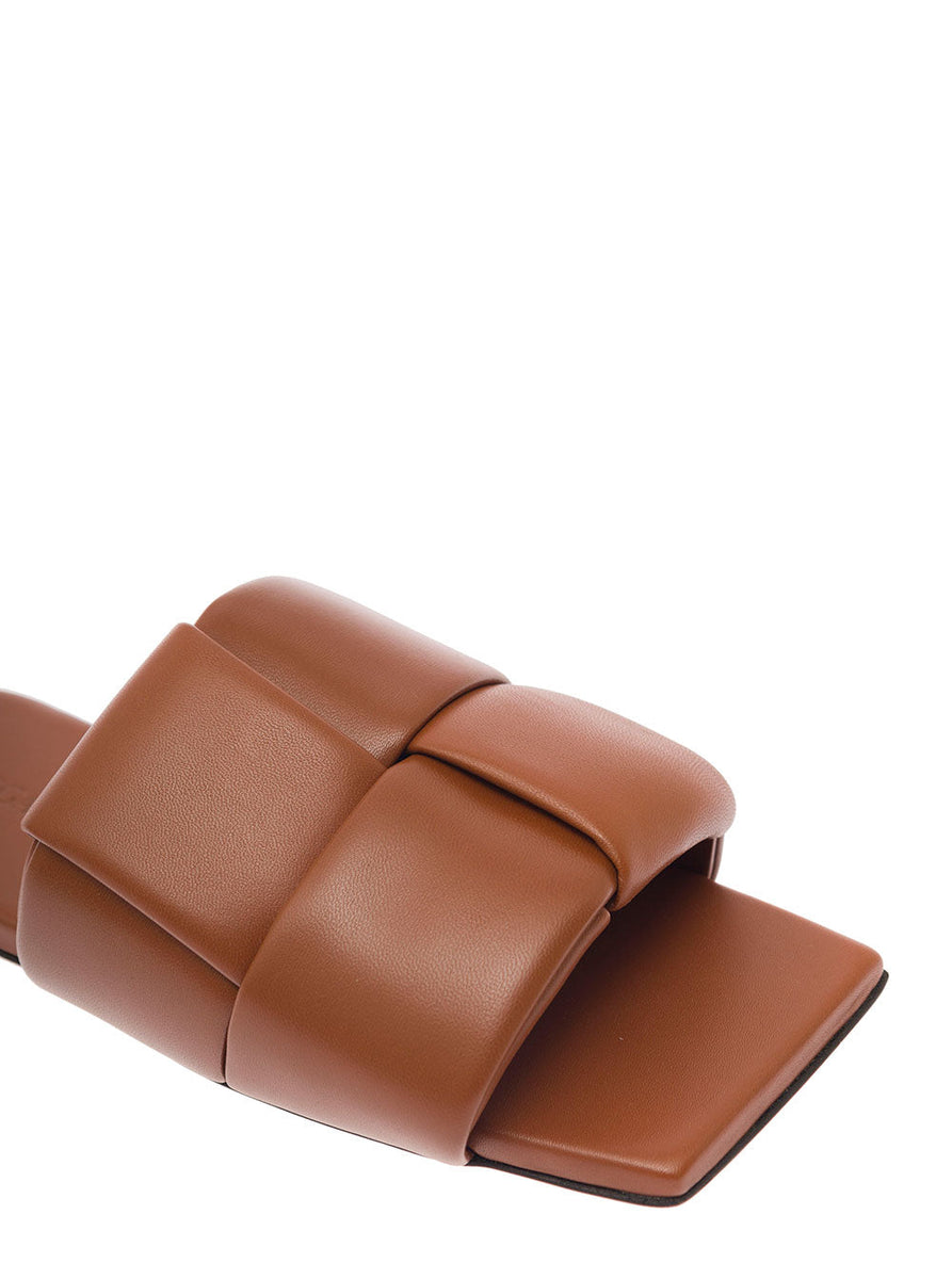 Close-up of Bottega Veneta flats hardware and fine stitching