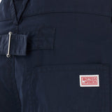 Close-up of Bottega Veneta pants hardware and fine stitching