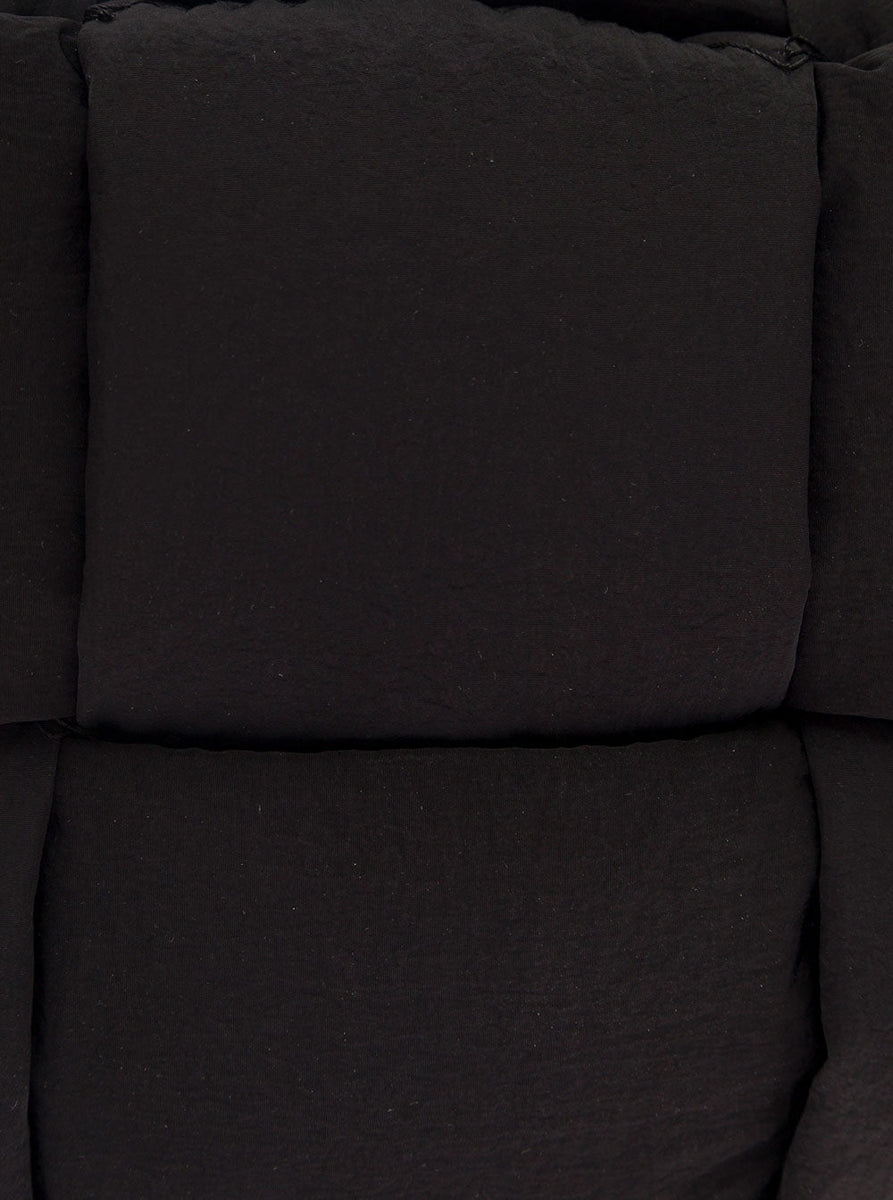 Close-up of Bottega Veneta cross body bags hardware and fine stitching