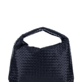 Close-up of Bottega Veneta cross body bags hardware and fine stitching