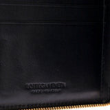 Close-up of Bottega Veneta jackets hardware and fine stitching