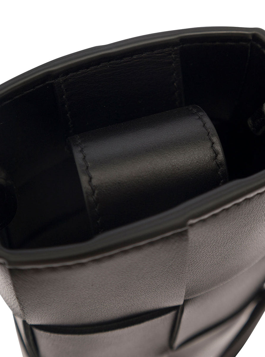 Close-up of Bottega Veneta cross body bags hardware and fine stitching