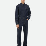 Close-up of Bottega Veneta pants hardware and fine stitching
