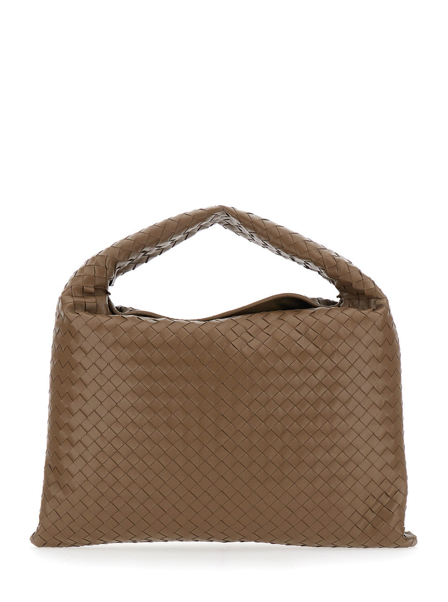 Close-up of Bottega Veneta cross body bags hardware and fine stitching