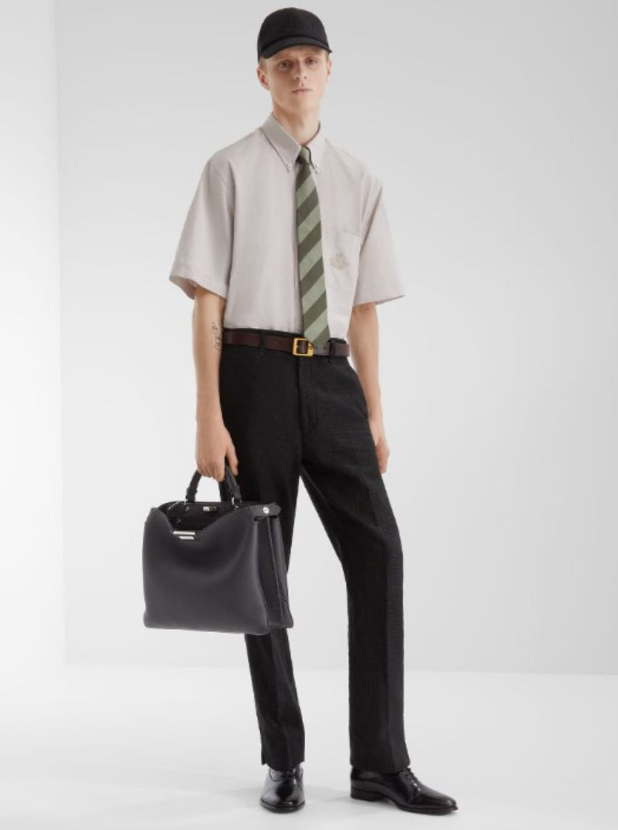 Close-up of Fendi blouses hardware and fine stitching
