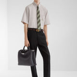 Close-up of Fendi blouses hardware and fine stitching