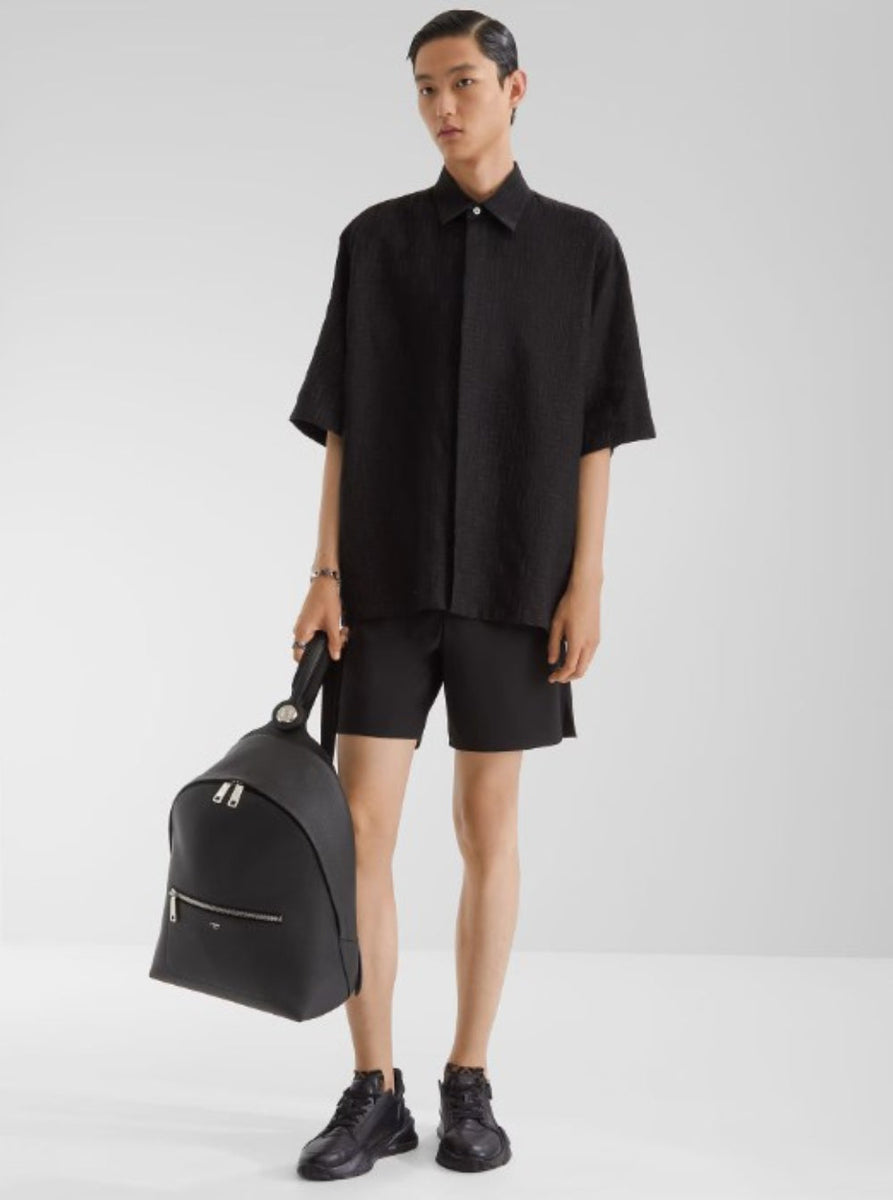 Close-up of Fendi blouses hardware and fine stitching