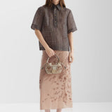 Close-up of Fendi skirts hardware and fine stitching