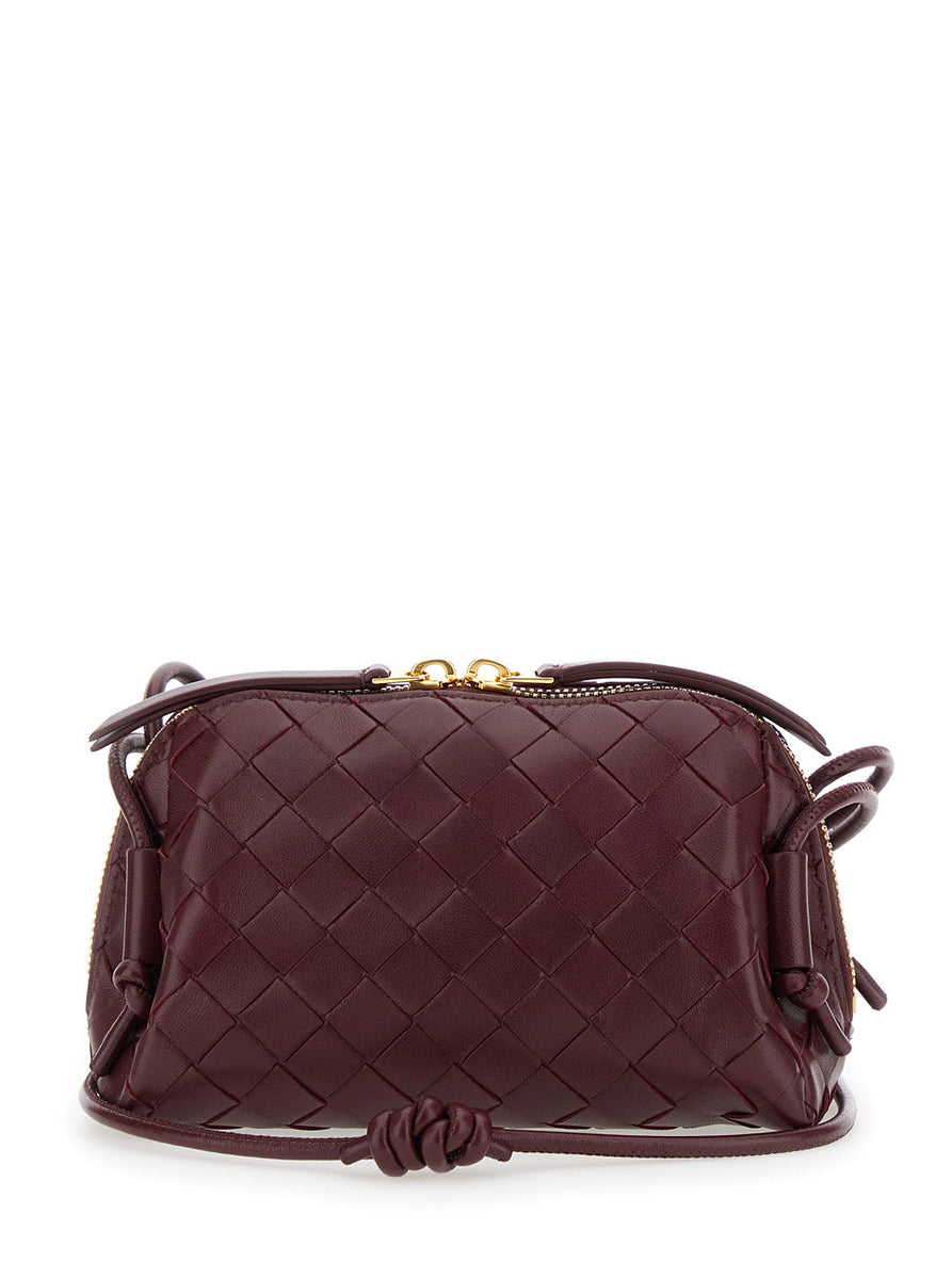 Close-up of Bottega Veneta cross body bags hardware and fine stitching