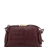 Close-up of Bottega Veneta cross body bags hardware and fine stitching