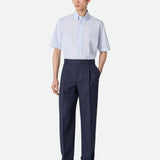 Close-up of Bottega Veneta pants hardware and fine stitching