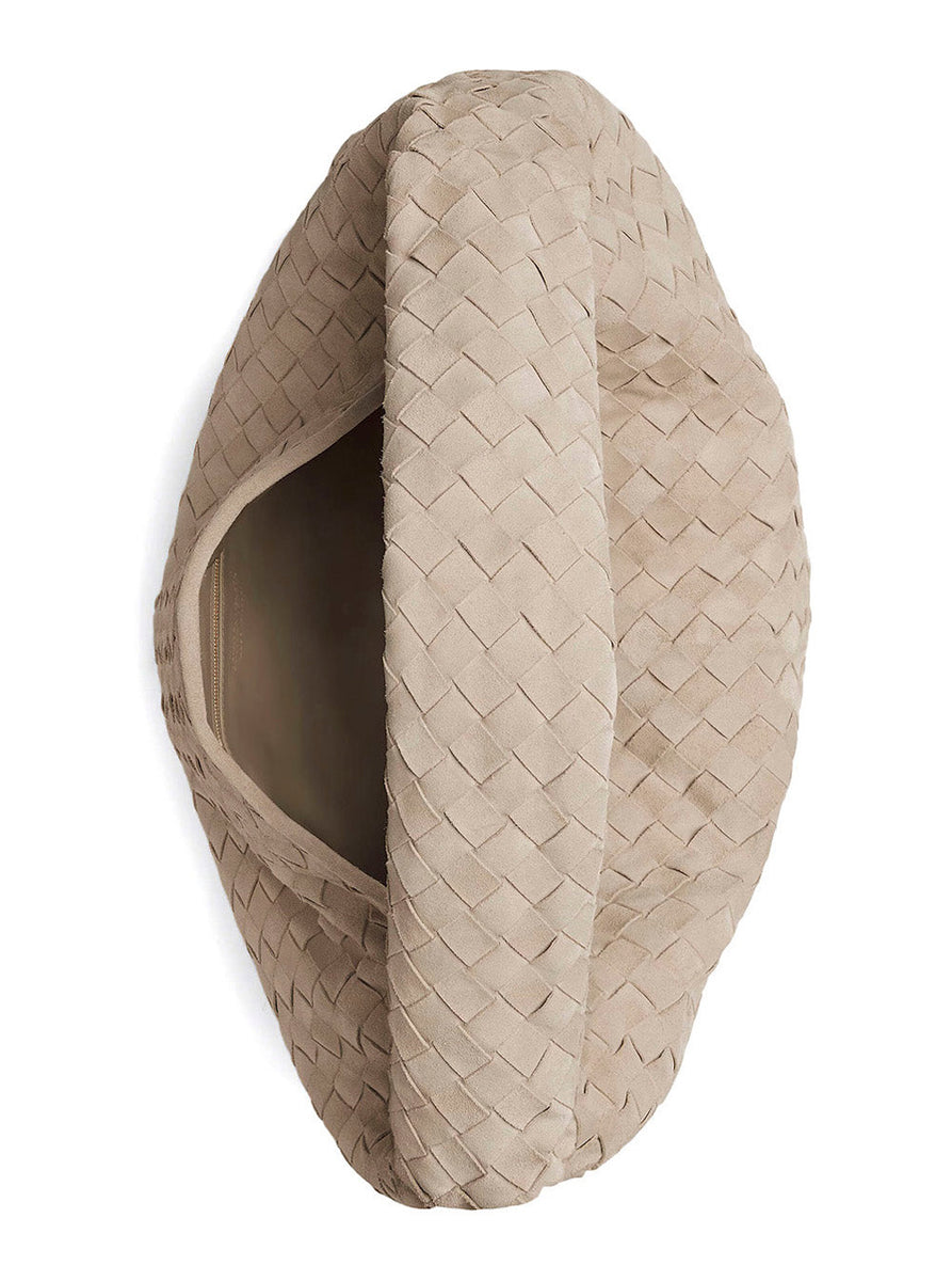 Close-up of Bottega Veneta cross body bags hardware and fine stitching
