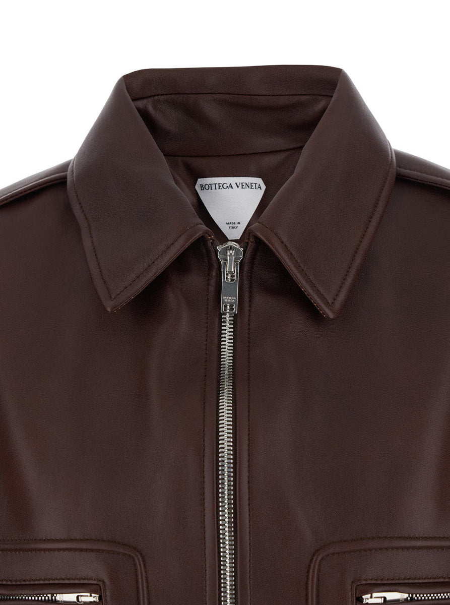 Close-up of Bottega Veneta jackets hardware and fine stitching