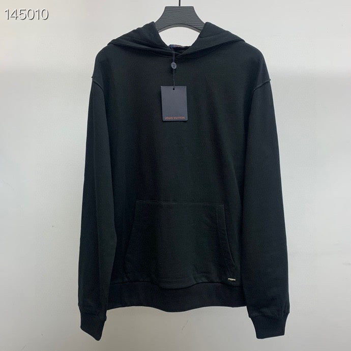 Close-up detail shot of Louis Vuitton luxury clothing with contemporary cut