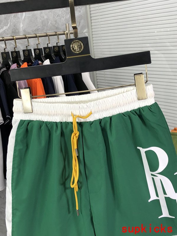 Close-up detail shot of Rhude luxury clothing with label-forward styling