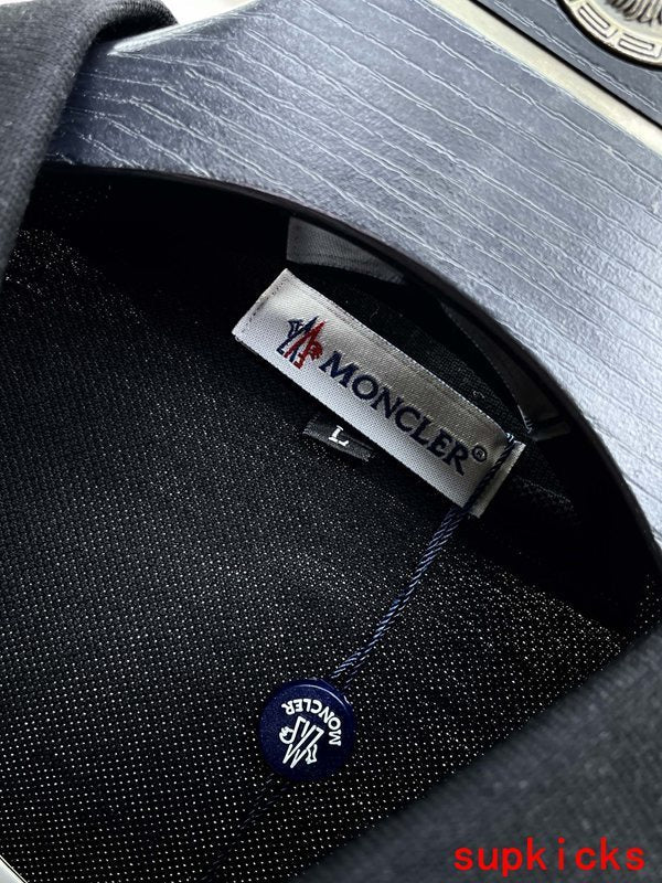 Side profile of Moncler luxury clothing with logo-detail design