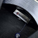 Side profile of Moncler luxury clothing with logo-detail design