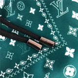 Flat lay presentation of Louis Vuitton cotton t-shirt with runway-inspired design