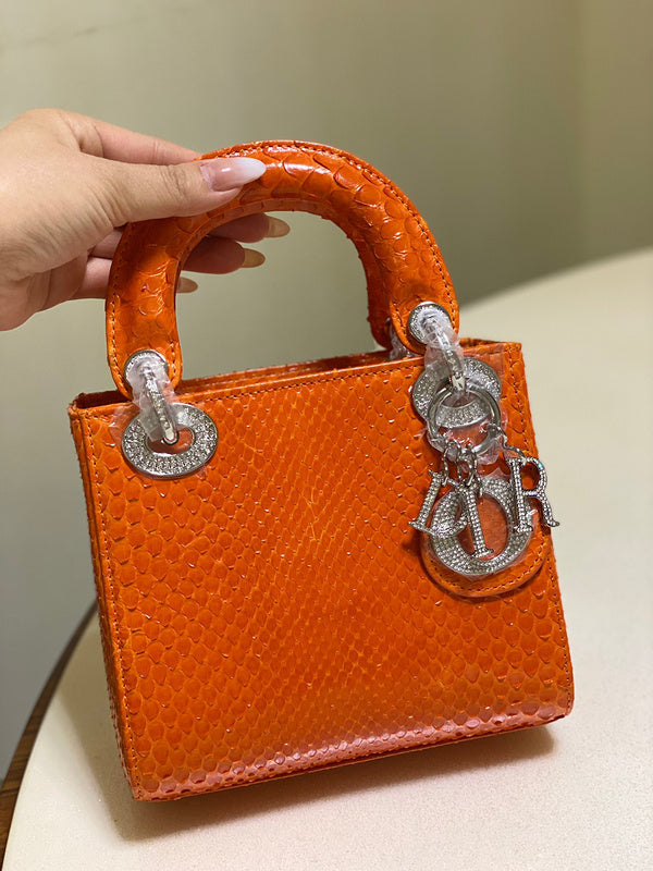 Side profile of polished sleek women's handbag – women's premium purse