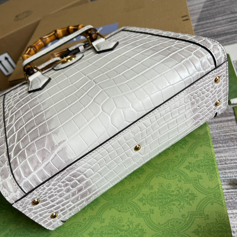 Styled lifestyle shot of structured statement women's handbag – women's luxury handbag