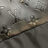 Flat lay presentation of Louis Vuitton luxury clothing with logo-detail design