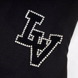 Flat lay presentation of Louis Vuitton luxury clothing with contemporary cut